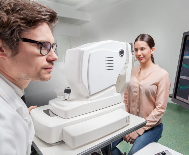 Doctor using advanced technology for optimal eye health to patient