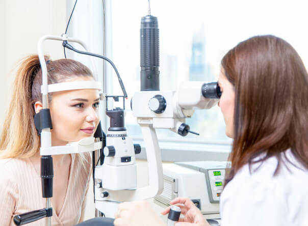 Woman undergoing eye exam