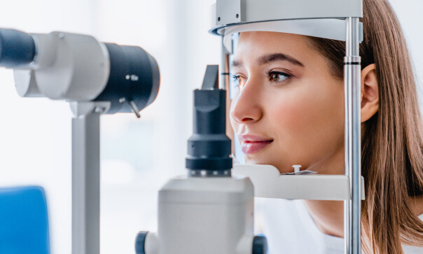 Female patient undergoing eye exam